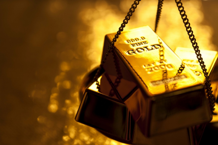 Giá vàng sẽ chịu sức ép trong các năm tới khi tiền đổ sang bitcoin. Ảnh: T.L