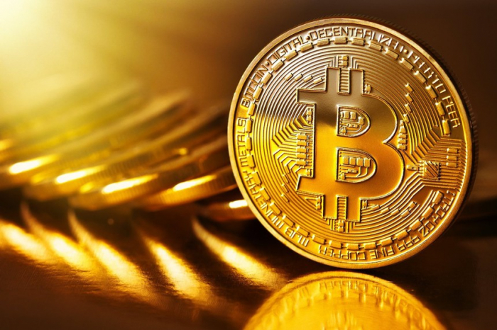 Bitcoin đạt mức cao nhất 50.000 USD trong cuộc cạnh tranh dài hạn với vàng. Ảnh: T.L