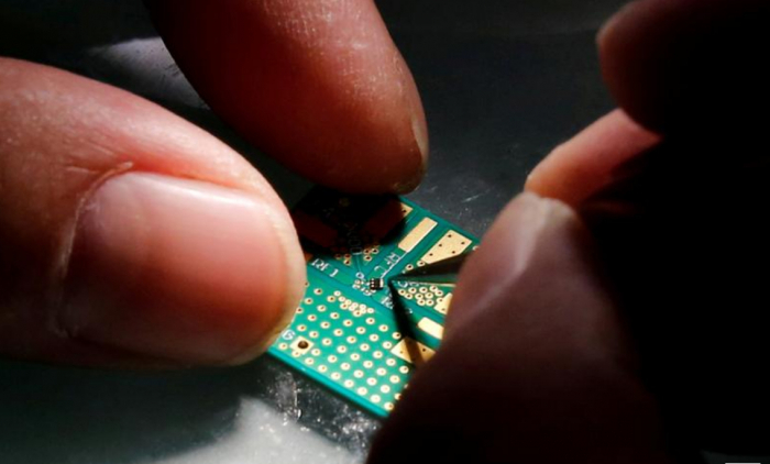 Doanh số chip toàn cầu tăng 5,6% trong năm 2020. Ảnh: Reuters
