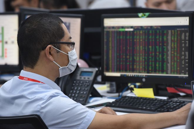 Thị trường chứng khoán Việt Nam được dự báo sẽ có diễn biến điều chỉnh trong những phiên đầu tuần này. Ảnh: T.L
