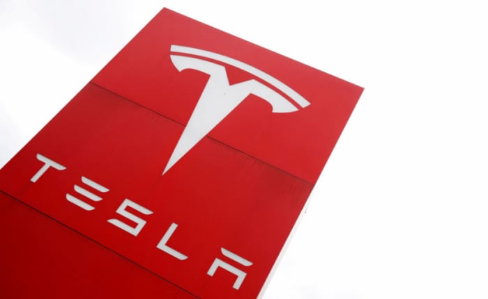 Tesla hòa vốn bitcoin. Ảnh: Reuters