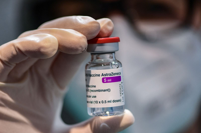 Việt Nam mong muốn tiếp cận vaccine ngừa Covid-19 của Pfizer để có thể tiêm cho trẻ em Việt Nam từ 12-18 tuổi. Ảnh: AFP.