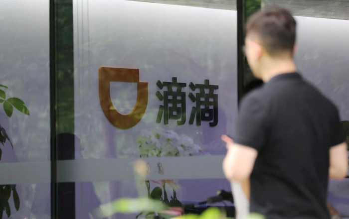 Cổ phiếu Didi Chuxing tiếp tục trượt dài sau IPO. Ảnh: Reuters.