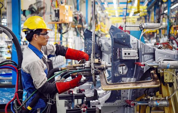Theo Bộ trưởng Bộ KH&ĐT Nguyễn Chí Dũng, doanh nghiệp đang đối mặt với không ít khó khăn, ảnh hưởng đến phục hồi sản xuất, kinh doanh. Ảnh: T.L