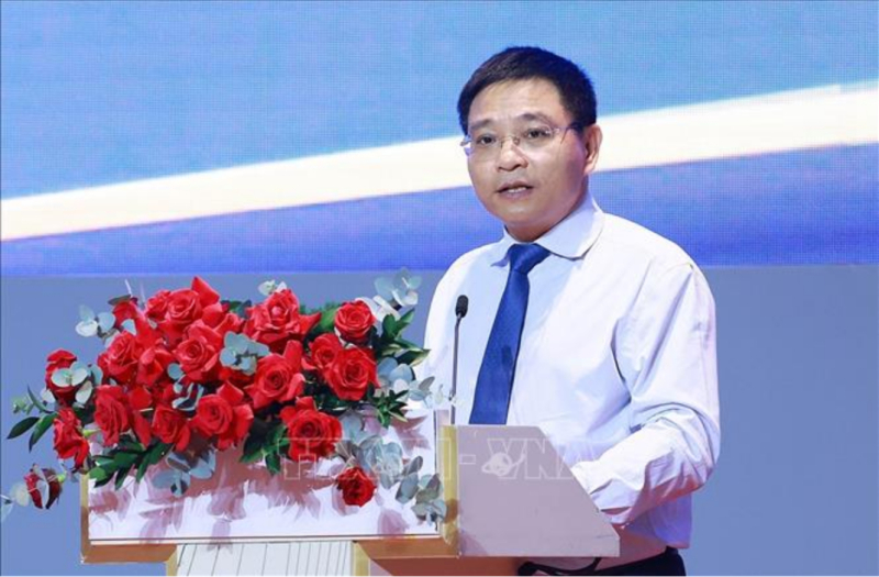 Bộ trưởng Bộ Tài chính Nguyễn Văn Thắng công bố Quyết định của Thủ tướng Chính phủ thành lập Ban Chỉ đạo quốc gia về Trung tâm tài chính quốc tế tại Việt Nam và Quyết định của Thủ tướng Chính phủ ban hành Kế hoạch hành động triển khai xây dựng Trung tâm tài chính quốc tế tại Việt Nam. Ảnh: Dương Giang/TTXVN